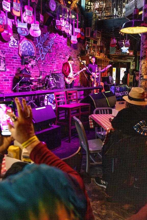 band performs on stage during IBC at Rum Boogie