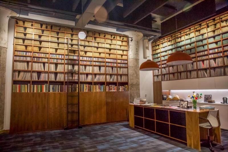 tall shelves of records at memphis listening lab