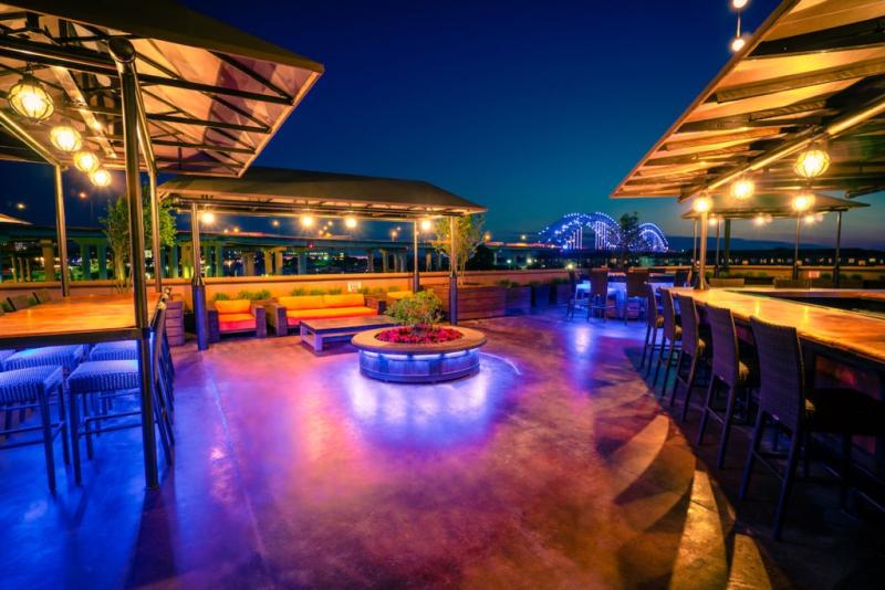 pyramid rooftop patio with fire pits and seating