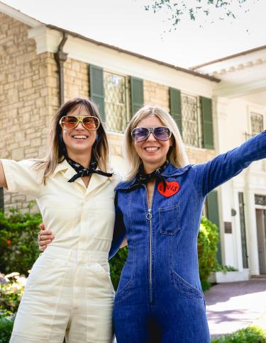 Elvis fans in front of the Graceland Mansion.