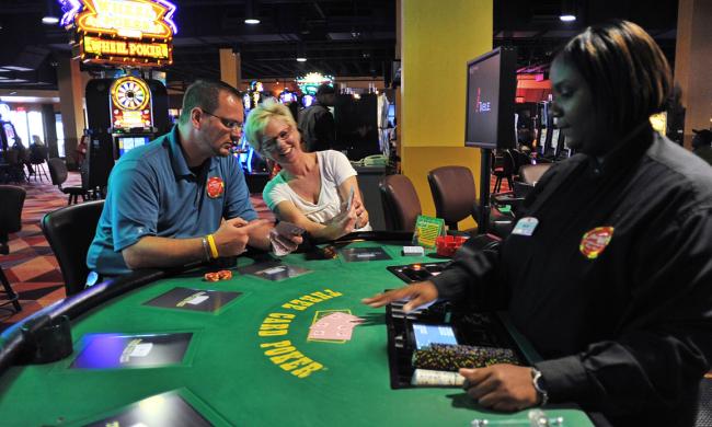 Two people playing table games at Southland Park Gaming | Andrea Zucker