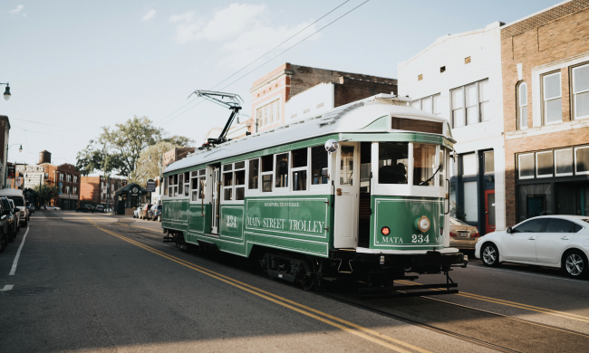 green trolley going down south main