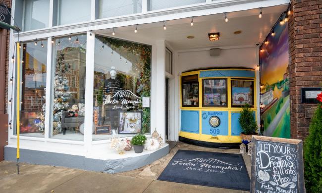 Storefront of Feelin' Memphis with Christmas decor in the window on South Main Street.