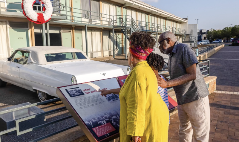 Family of three outside the Lorraine Motel in Memphis.